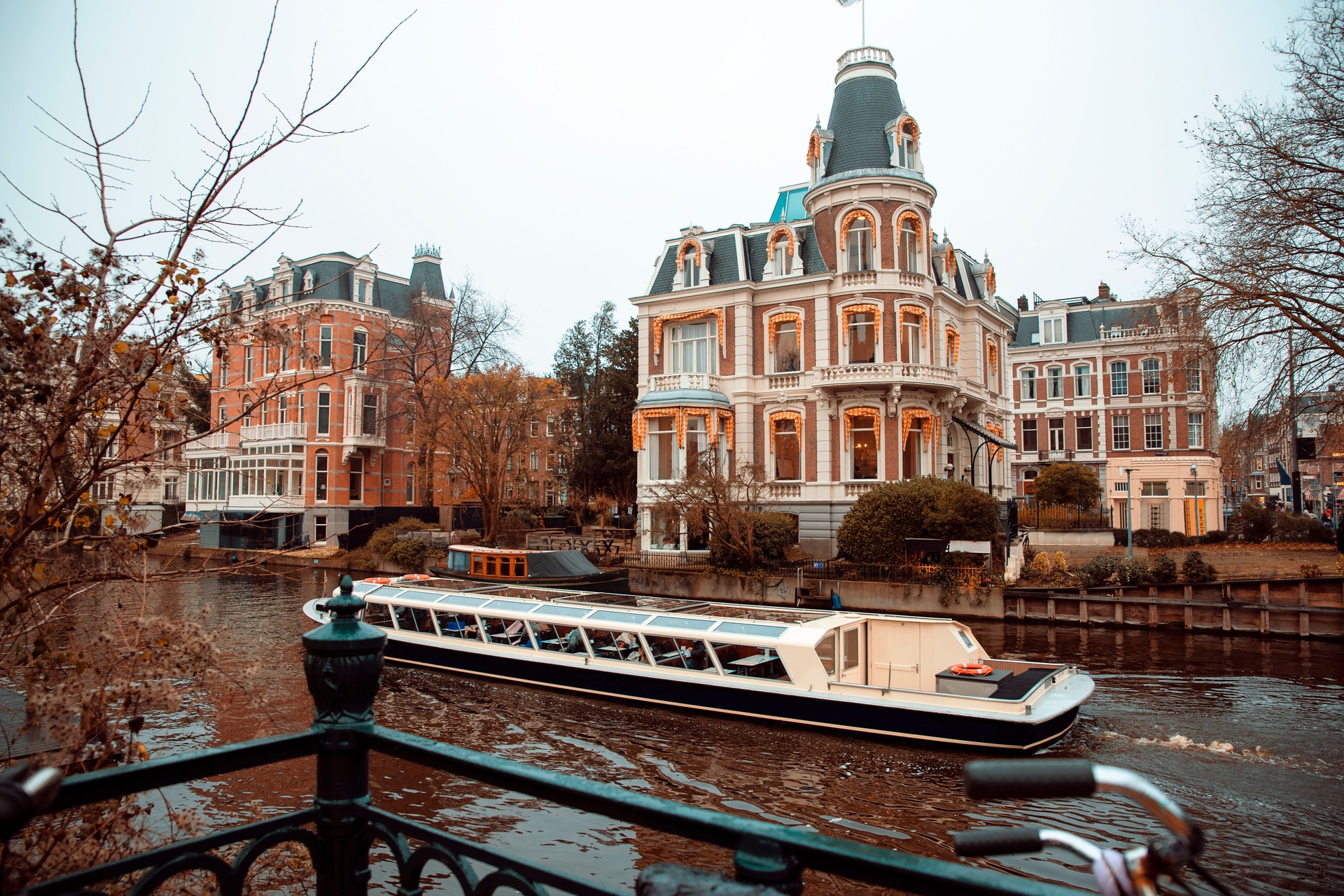 Amsterdam sightseeing cruise boat on sea Canal